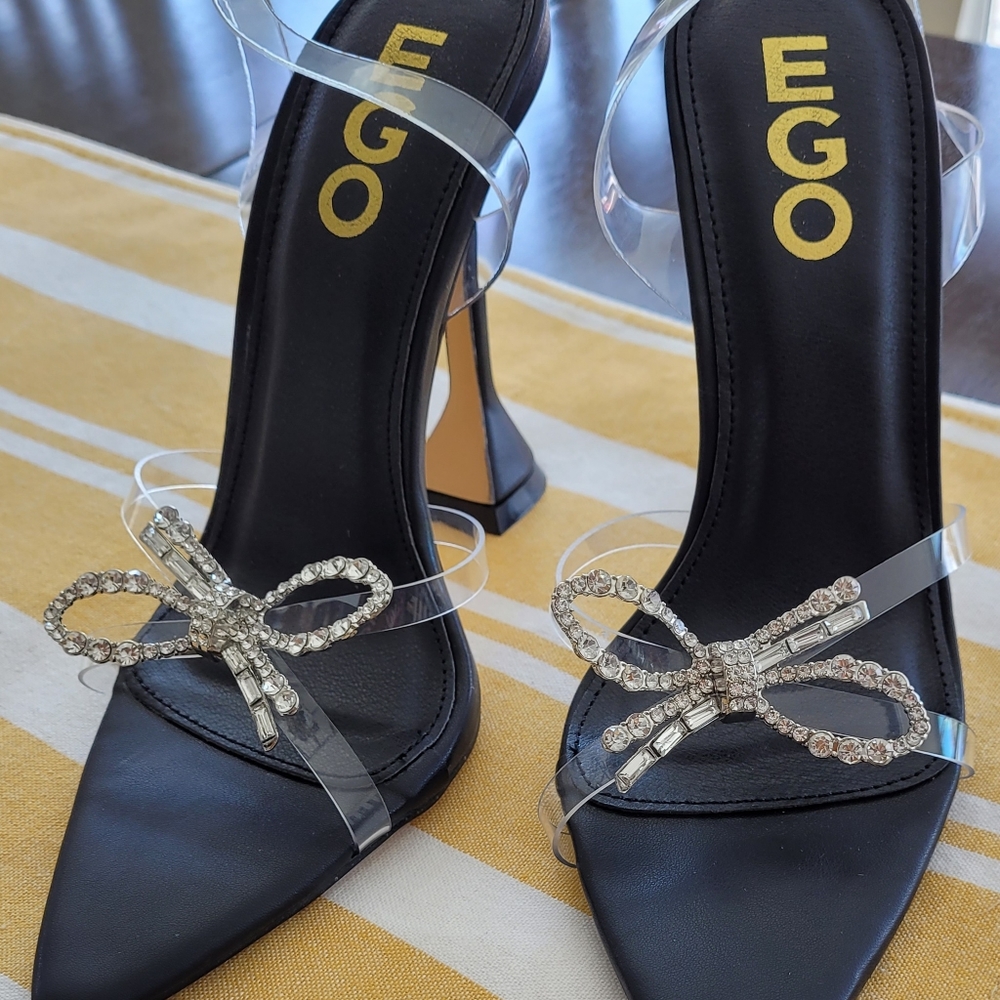 EGO SPARK BLACK HEELS WITH CLEAR PLASTIC STRAPS AND JEWELED BOW NARROW SIZE 7US